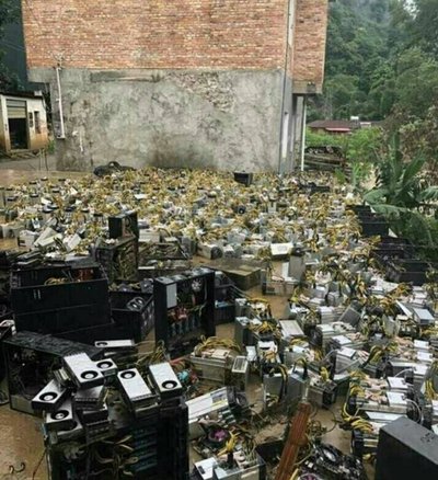 A look inside a large-scale mining farm with numerous mining rigs operating